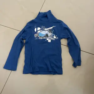Pull à colle roulé pour garçon 