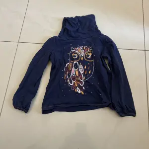 Pull à colle roulé pour fille 