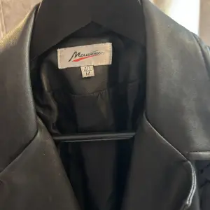 Veste un cuir 