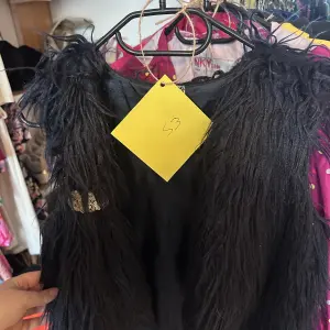 Veste sans manche noir pour fille 